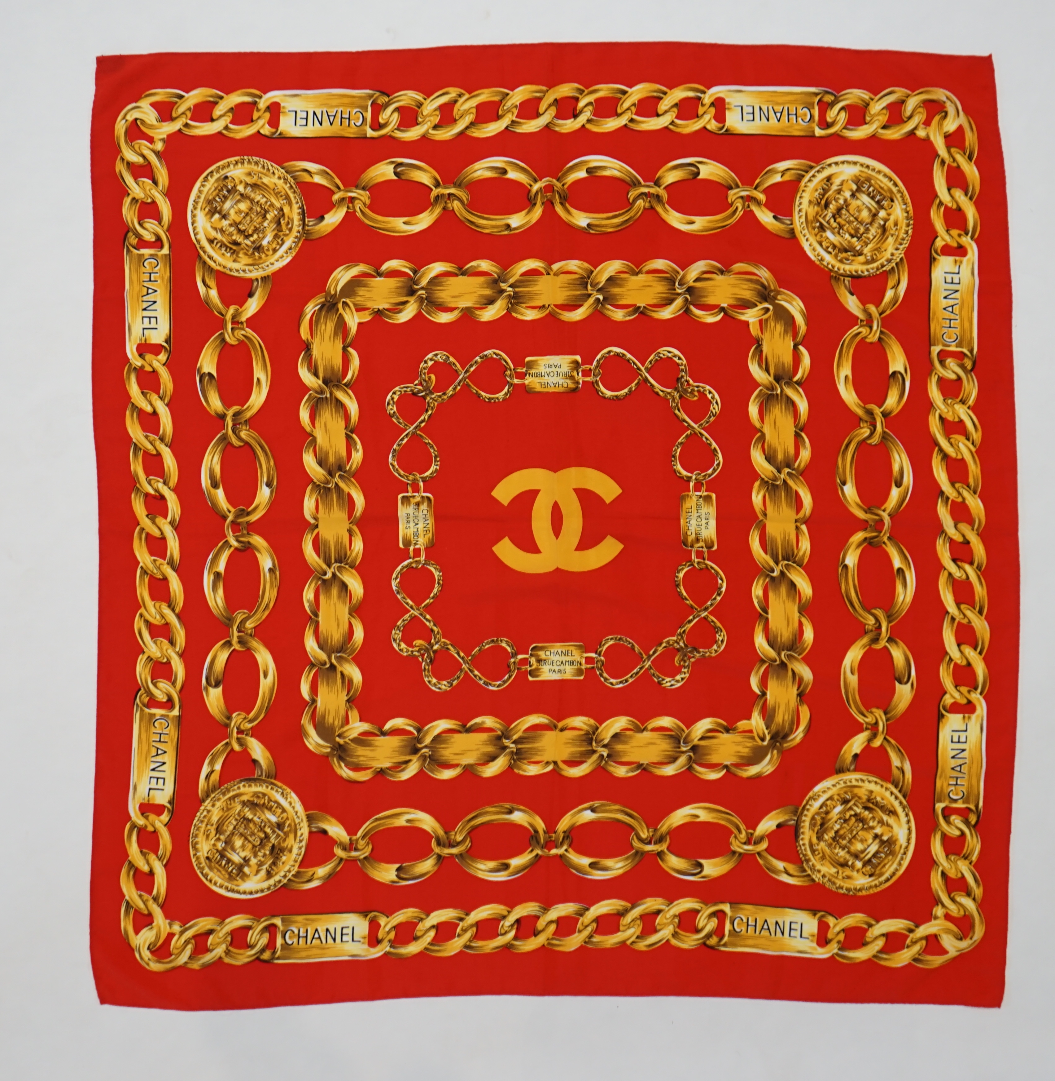 A Chanel Red Chain large silk scarf, 80cm x 80cm